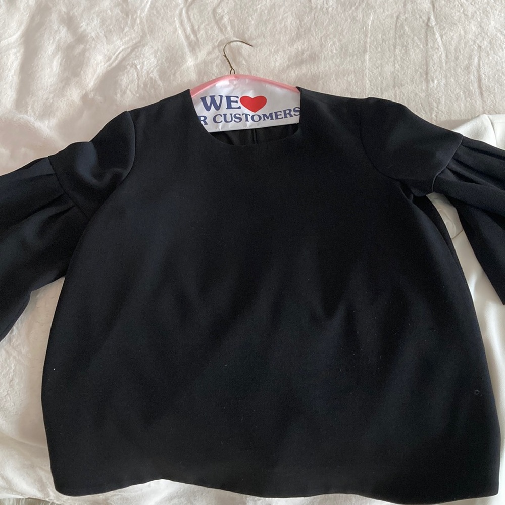 Avon Lane bell sleeved top.